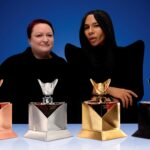 Dr Emma Walker and fashion designer Olivier Rousteing with the Couture Expressions collection