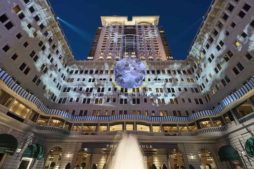 Lunar Rainbow by Phoebe Hui, projection onto the Peninsula HK facade.